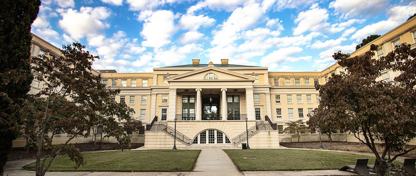 South Quad under a cloudy blue Carolina sky