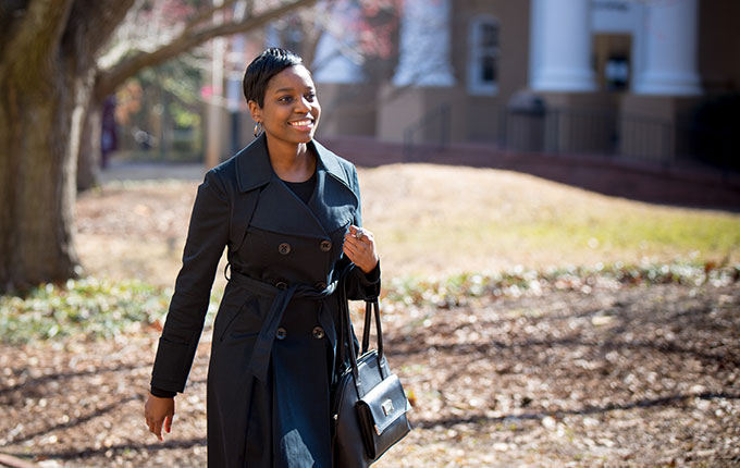 woman walking on campus