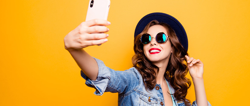 Young woman taking a selfie