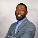 headshot of brandon grooms
