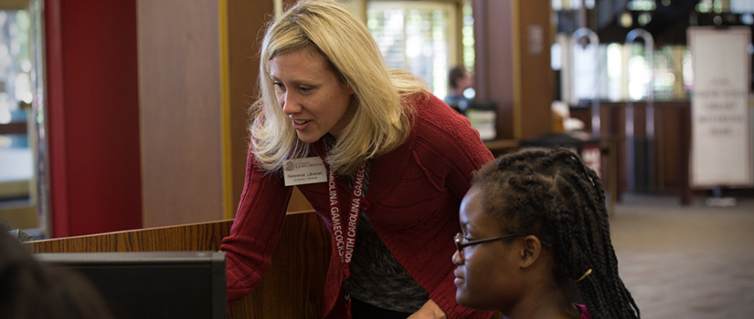 librarian helping a student