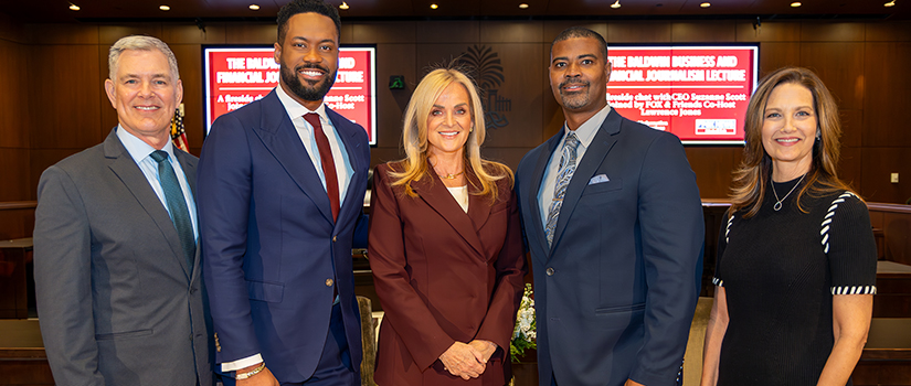 Baldwin lecturer Suzanne Scott with the dean and director