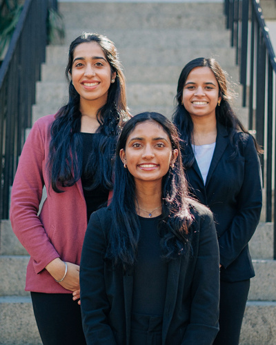 Three women smiling
