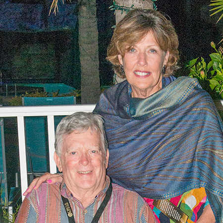 Frank and Sally Roach smile for a photo together.