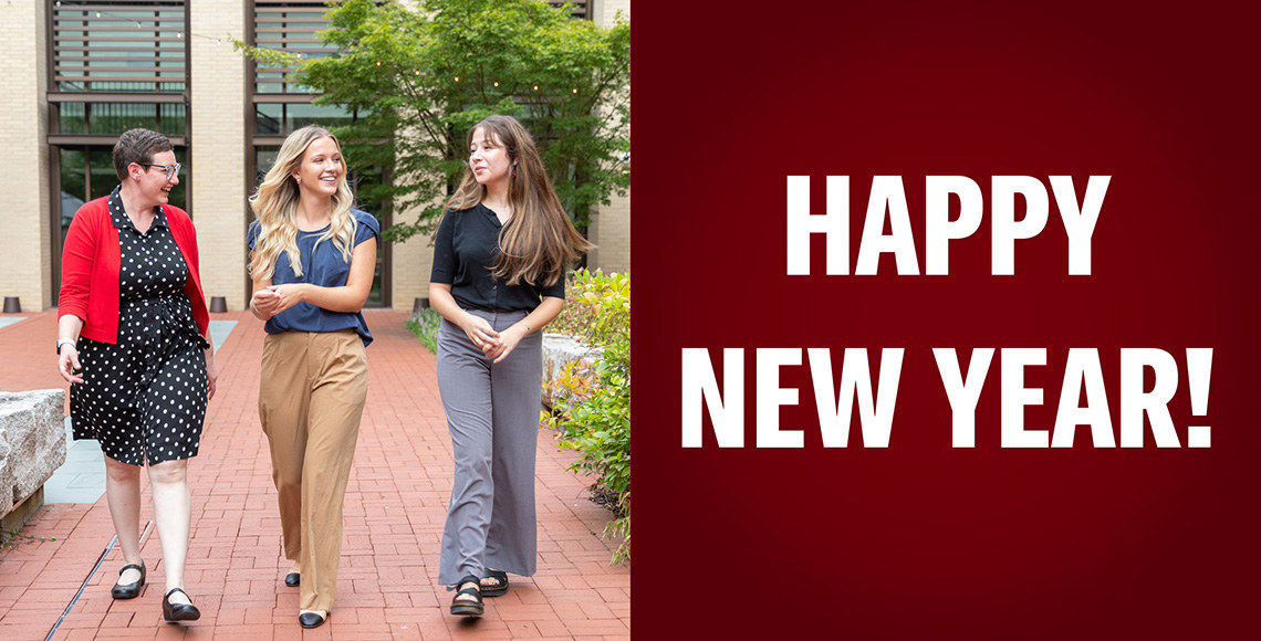 Happy New Year banner with picture of students walking in Courtyard at Law School