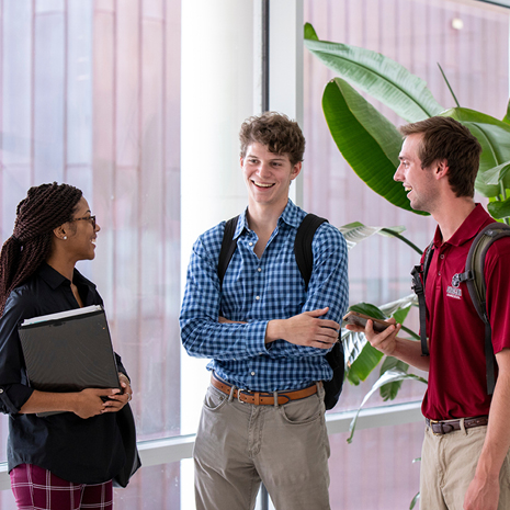 Stock photo of students in the Moore School