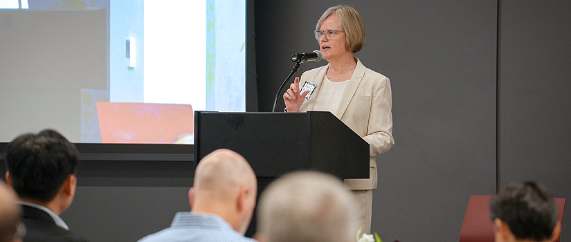 Professor Audrey Korsgaard speaking at the Moore School's AI Summit