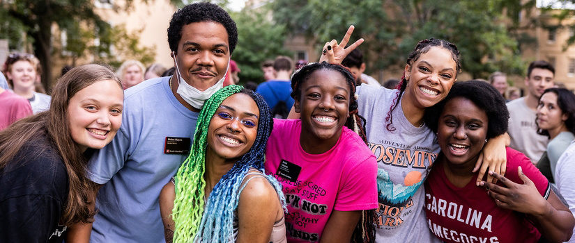 Students posing and smiling