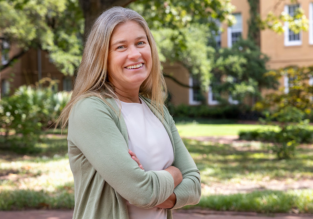 Woman standing on campus