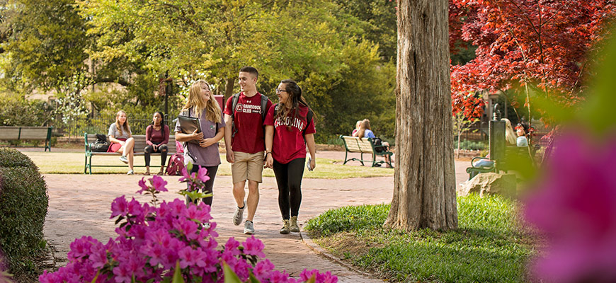 three students walking