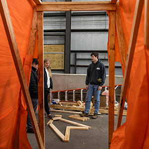 Students working on the tiger structure that will burn at Tiger Burn