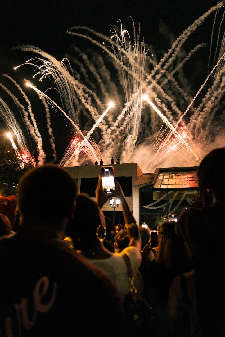 Students looking up watching fireworks 