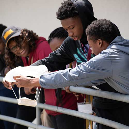 Engineering students test projects.