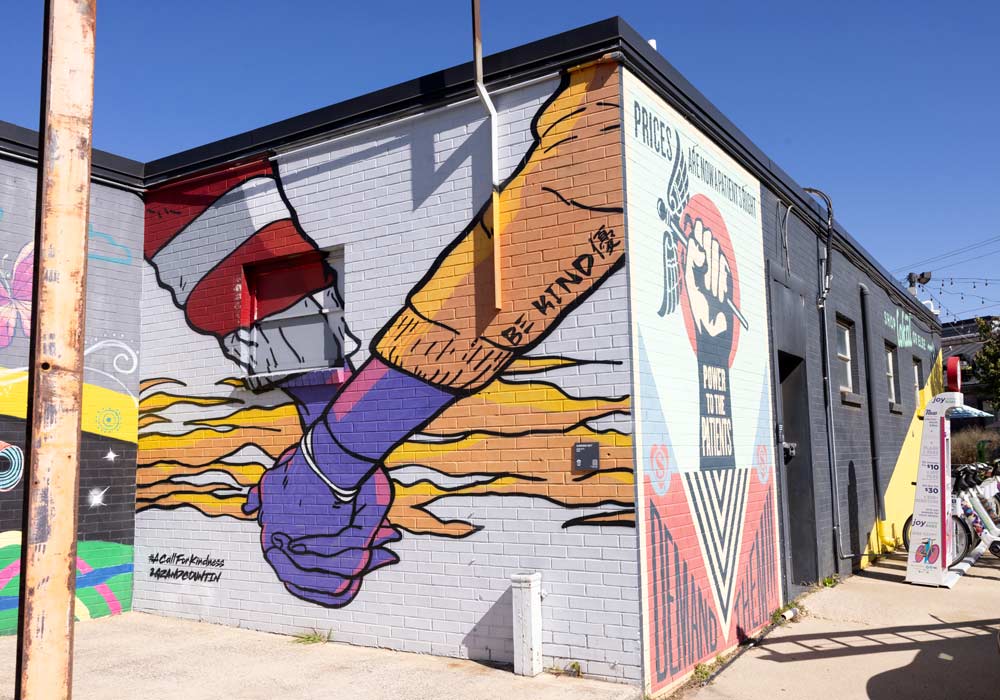 A 2022 mural at Camp North End in Charlotte, North Carolina by Garrison Gist