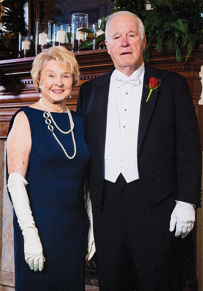 Kay Baker and Eddie Floyd stand together in formal attire.